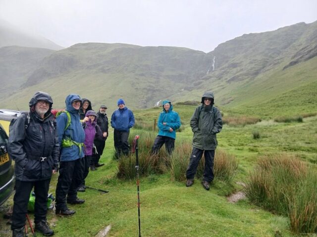 Cumbria Lichenologists and Bryologists in a Group photo in the rain